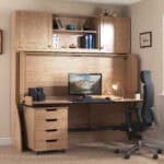 Modern wooden study desk with hutch and ergonomic office chair, ideal for student study spaces and home office setups, featuring ample storage and a computer workspace.