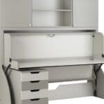 Modern white study desk with storage drawers and adjustable shelves, designed for optimal space utilisation in student bedrooms or home office setups.